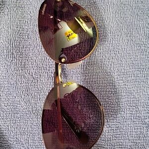 Polaroid Dark Purple Sunglasses EXCELLENT CONDITION VERY SNUG FIT TEMPLES  NEW